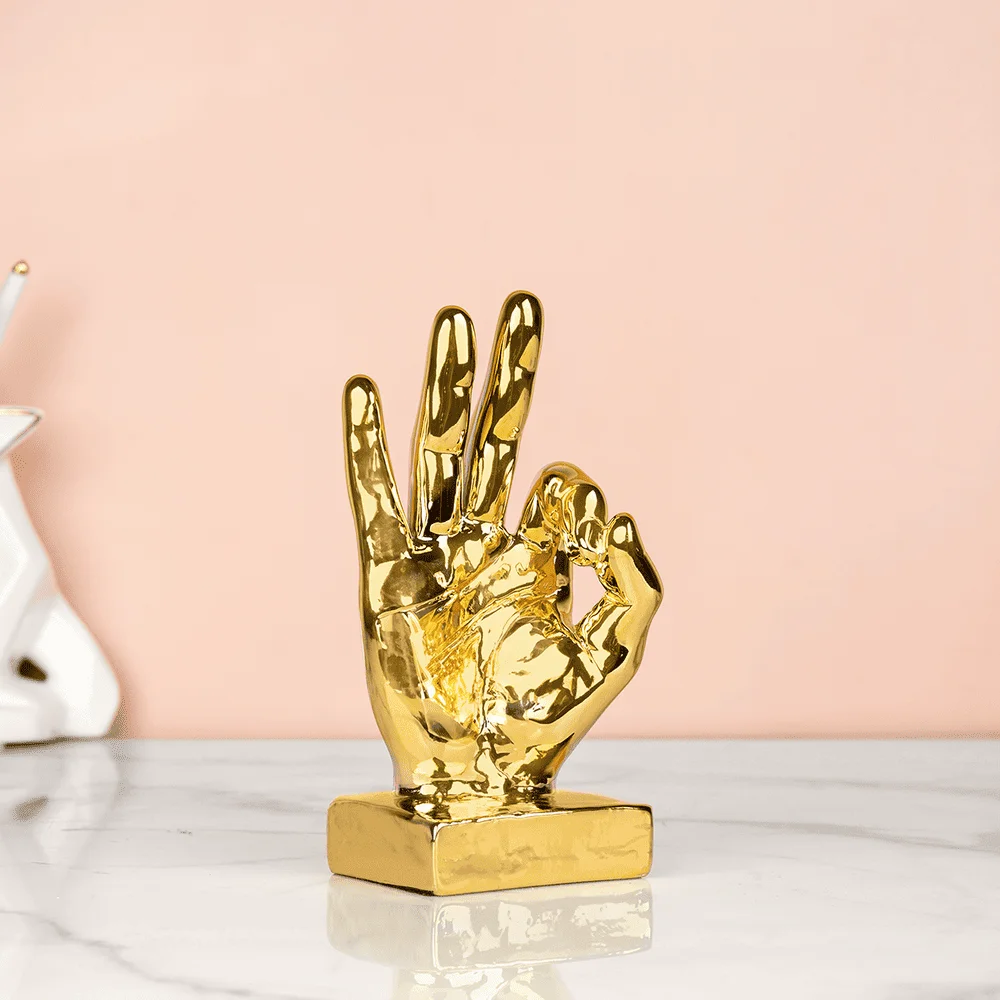 golden ok finger gesture showpiece